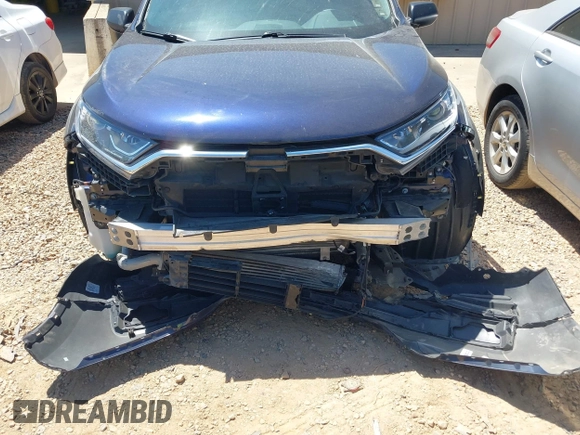 2020 Honda CR-V LX with VIN 2HKRW1H22LH412512, listed as a IAAI auction lot 42107381 with 60,062 mi miles and . Bid and sale history available at DreamBid. Image 6.