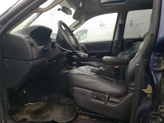 2004 Jeep Grand Cherokee Laredo с VIN 1J4GW48S94C258963, выставлен на аукционе Copart как лот 57390035 с пробегом 179 385 миль миль и Списание • Salvage title. История ставок и продаж доступна на DreamBid. Изображение 7.