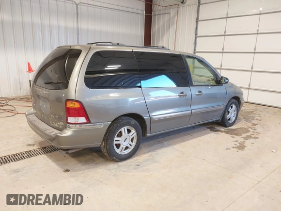 2003 Ford Windstar SE with VIN 2FMZA52413BB09700, listed as a IAAI auction lot 41037056 with 179,486 mi miles and . Bid and sale history available at DreamBid. Image 4.