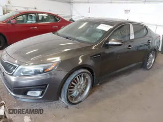 2015 Kia Optima EX with VIN 5XXGN4A73FG372426, listed as a IAAI auction lot 42630287 with 154,060 mi miles and . Bid and sale history available at DreamBid. Image 2.
