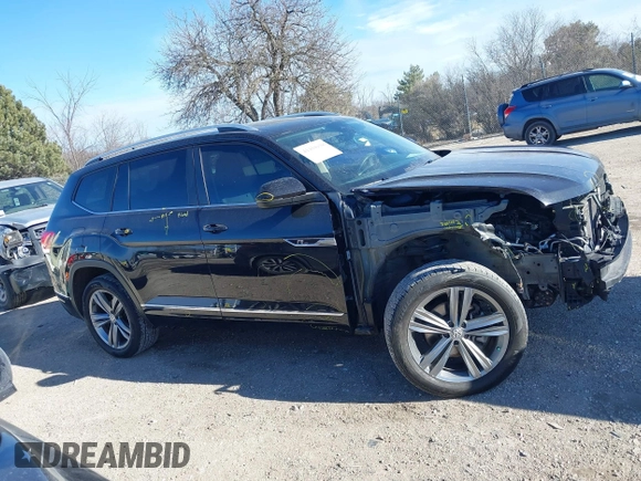 2019 Volkswagen Atlas SEL R-Line z VIN 1V2RR2CA6KC509913, wystawiony jako IAAI lot #41410198 z przebiegiem 97 681 mil mil oraz . Historia ofert i sprzedaży dostępna na DreamBid. Obrazek 13.