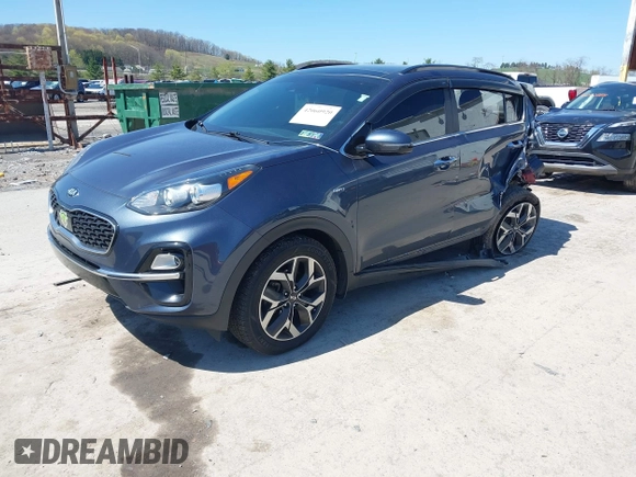 2020 Kia Sportage EX with VIN KNDPNCAC3L7752538, listed as a IAAI auction lot 42060920 with 68,740 mi miles and . Bid and sale history available at DreamBid. Image 2.