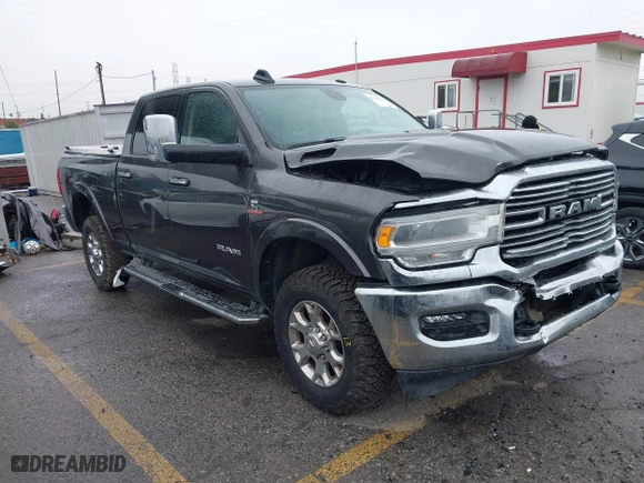 2022 Ram 2500 Laramie with VIN 3C6UR5FL2NG243857, listed as a IAAI auction lot 41736144 with 58,474 mi miles. Bid and sale history available at carsss.com. Image 1.