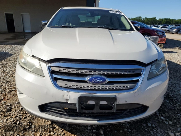 2011 Ford Taurus SEL z VIN 1FAHP2EW2BG188513, wystawiony jako Copart lot #58017755 z przebiegiem 211 530 mil mil oraz Szkoda całkowita • Salvage title. Historia ofert i sprzedaży dostępna na DreamBid. Obrazek 5.