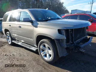 2017 Chevrolet Tahoe LT with VIN 1GNSKBKC6HR349779, listed as a IAAI auction lot 41612549 with 142,952 mi miles and . Bid and sale history available at DreamBid. Image 1.