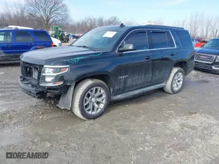 2016 Chevrolet Tahoe LT with VIN 1GNSKBKC8GR367215, listed as a IAAI auction lot 41702352 with 106,434 mi miles. Bid and sale history available at carsss.com. Image 2.