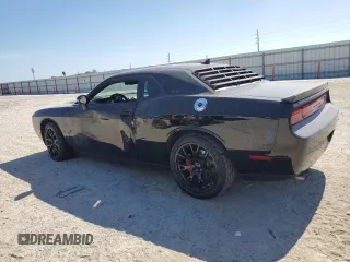 2014 Dodge Challenger R/T z VIN 2C3CDYBT6EH112199, wystawiony jako Copart lot #58023535 z przebiegiem 99 977 mil mil oraz Szkody całkowita. Historia ofert i sprzedaży dostępna na DreamBid. Obrazek 2.