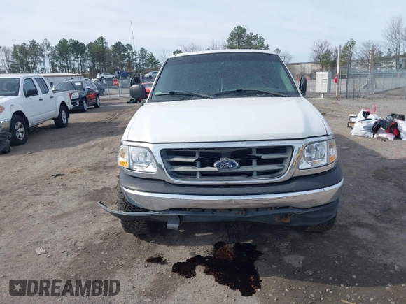 2000 Ford F-150 XL with VIN 1FTRX17LXYNC39983, listed as a IAAI auction lot 41750277 with 170,016 mi miles. Bid and sale history available at carsss.com. Image 12.