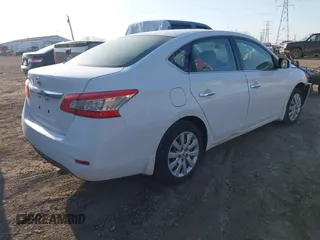 2015 Nissan Sentra S with VIN 3N1AB7AP6FY357106, listed as a IAAI auction lot 41773210 with 138,621 mi miles. Bid and sale history available at carsss.com. Image 4.