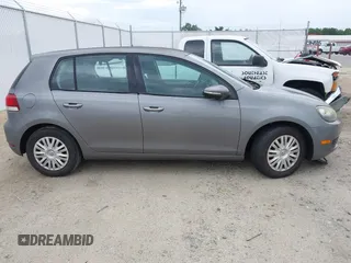 2011 Volkswagen Golf z VIN WVWDA9AJ8BW009300, wystawiony jako IAAI lot #42480823 z przebiegiem 108 645 mil mil oraz . Historia ofert i sprzedaży dostępna na DreamBid. Obrazek 14.