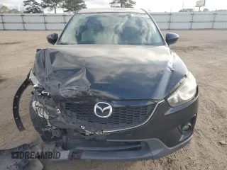 2014 Mazda CX-5 Touring with VIN JM3KE2CY9E0336218, listed as a Copart auction lot 49213255 with 124,749 mi miles and Salvage Title. Bid and sale history available at carsss.com. Image 5.