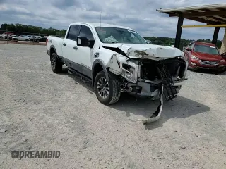 2018 Nissan Titan Platinum Reserve with VIN 1N6BA1F49JN521225, listed as a Copart auction lot 69831004 with 92,536 mi miles and Salvage title. Bid and sale history available at DreamBid. Image 10.