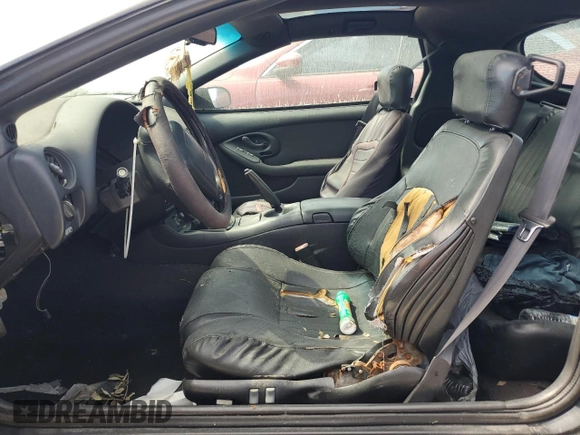 2000 Pontiac Firebird Formula z VIN 2G2FV22G9Y2140113, wystawiony jako Copart lot #76135324 z przebiegiem Nie podano mil oraz Szkoda całkowita • Salvage title. Historia ofert i sprzedaży dostępna na DreamBid. Obrazek 7.