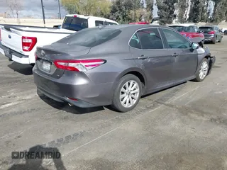 2020 Toyota Camry LE with VIN 4T1C11AK3LU363417, listed as a IAAI auction lot 41430382 with 130,837 mi miles. Bid and sale history available at carsss.com. Image 4.