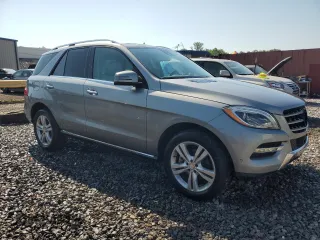 2014 Mercedes-Benz M 350 with VIN 4JGDA2EB4EA406865, listed as a Copart auction lot 61630045 with 142,616 mi miles and Salvage title. Bid and sale history available at DreamBid. Image 4.