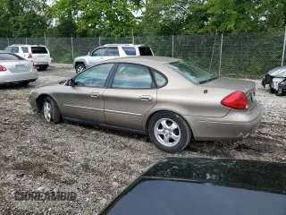 2003 Ford Taurus SES Standard z VIN 1FAFP55U33A123732, wystawiony jako Copart lot #58837395 z przebiegiem 169 159 mil mil oraz Szkoda całkowita • Salvage title. Historia ofert i sprzedaży dostępna na DreamBid. Obrazek 2.