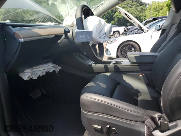 2024 Tesla Model Y с VIN 7SAYGDED1RF092027, выставлен на аукционе Copart как лот 62330775 с пробегом 22 010 миль миль и Списание • Salvage title. История ставок и продаж доступна на DreamBid. Изображение 7.