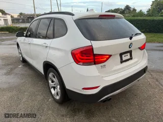 2013 BMW X1 28i with VIN WBAVM1C54DVW42766, listed as a Copart auction lot 54416745 with 121,067 mi miles and Clean Title. Bid and sale history available at carsss.com. Image 3.