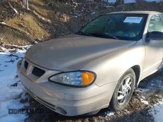 2004 Pontiac Grand Am SE with VIN 1G2NE52F24C231559, listed as a IAAI auction lot 41606544 with 65,524 mi miles. Bid and sale history available at carsss.com. Image 12.