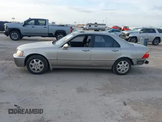 2002 Acura RL z VIN JH4KA96552C008589, wystawiony jako IAAI lot #41860930 z przebiegiem 210 847 mil mil oraz . Historia ofert i sprzedaży dostępna na DreamBid. Obrazek 15.