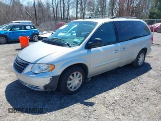 2006 Chrysler Town & Country LWB Touring with VIN 2A4GP54LX6R844499, listed as a IAAI auction lot 42082846 with 133,091 mi miles. Bid and sale history available at carsss.com. Image 2.