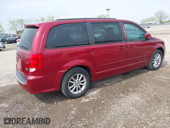 2014 Dodge Grand Caravan SXT with VIN 2C4RDGCG4ER120877, listed as a IAAI auction lot 42142083 with 199,895 mi miles and . Bid and sale history available at DreamBid. Image 4.
