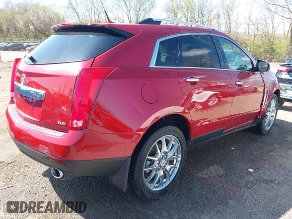 2014 Cadillac SRX Performance Collection with VIN 3GYFNCE34ES519563, listed as a IAAI auction lot 41967051 with 12,603 mi miles and . Bid and sale history available at carsss.com. Image 4.