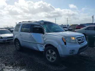 2009 Honda Pilot EX with VIN 5FNYF484X9B003423, listed as a IAAI auction lot 41650900 with 143,579 mi miles. Bid and sale history available at carsss.com. Image 1.