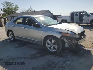 2009 Acura TSX z VIN JH4CU266X9C010134, wystawiony jako Copart lot #52143775 z przebiegiem 260 019 mil mil oraz Szkoda całkowita • Salvage title. Historia ofert i sprzedaży dostępna na DreamBid. Obrazek 4.