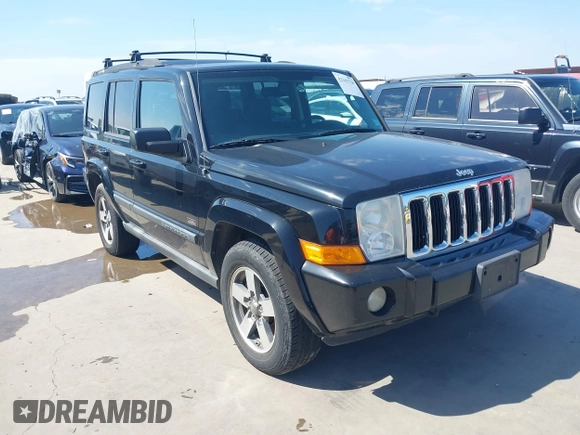 2007 Jeep Commander Sport z VIN 1J8HH48P97C619556, wystawiony jako IAAI lot #42343720 z przebiegiem 152 647 mil mil oraz . Historia ofert i sprzedaży dostępna na DreamBid. Obrazek 1.