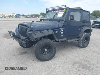 1997 Jeep Wrangler Sport with VIN 1J4FY19S2VP481780, listed as a IAAI auction lot 41822213 with 156,629 mi miles. Bid and sale history available at carsss.com. Image 2.
