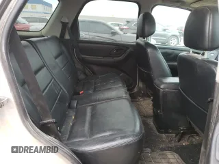 2004 Ford Escape Limited with VIN 1FMCU94184KB62778, listed as a Copart auction lot 70992184 with 165,199 mi miles and Salvage Title. Bid and sale history available at carsss.com. Image 11.