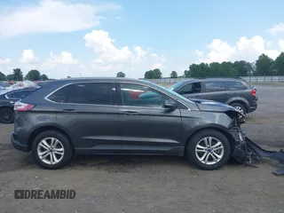 2020 Ford Edge SEL z VIN 2FMPK4J98LBA29600, wystawiony jako IAAI lot #42547635 z przebiegiem 82 222 mil mil oraz . Historia ofert i sprzedaży dostępna na DreamBid. Obrazek 14.