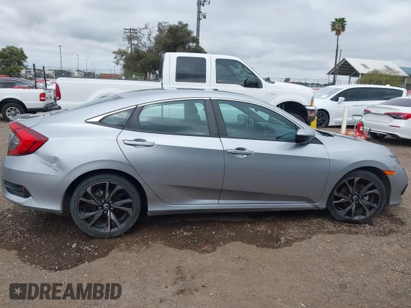 2021 Honda Civic Sport with VIN 2HGFC2F83MH510243, listed as a IAAI auction lot 41856857 with 95,739 mi miles and . Bid and sale history available at DreamBid. Image 13.