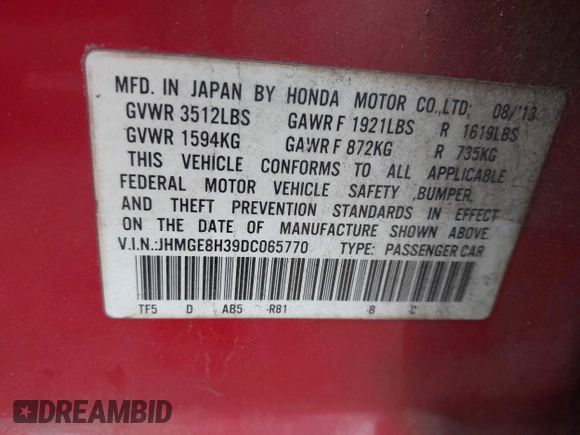 2013 Honda Fit with VIN JHMGE8H39DC065770, listed as a IAAI auction lot 42024432 with 67,267 mi miles. Bid and sale history available at carsss.com. Image 9.