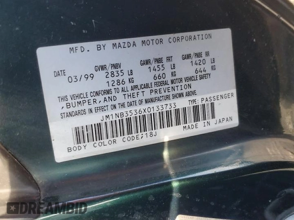 1999 Mazda MX-5 Miata z VIN JM1NB3536X0133733, wystawiony jako Copart lot #50906215 z przebiegiem Nie podano mil oraz Szkoda całkowita • Salvage title. Historia ofert i sprzedaży dostępna na DreamBid. Obrazek 13.