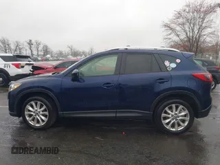 2014 Mazda CX-5 Grand Touring with VIN JM3KE4DY8E0366644, listed as a IAAI auction lot 41971438 with 135,644 mi miles and . Bid and sale history available at carsss.com. Image 14.