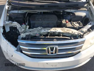2012 Honda Odyssey Touring with VIN 5FNRL5H93CB146753, listed as a IAAI auction lot 41984850 with 155,309 mi miles and . Bid and sale history available at DreamBid. Image 10.