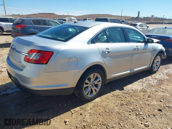 2011 Ford Taurus SEL with VIN 1FAHP2EW5BG133814, listed as a IAAI auction lot 41608224 with 127,075 mi miles. Bid and sale history available at carsss.com. Image 4.