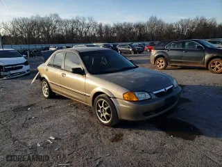 2000 Mazda Protege DX with VIN JM1BJ2222Y0238301, listed as a Copart auction lot 85283554 with 326,226 mi miles and Non Repairable. Bid and sale history available at carsss.com. Image 11.