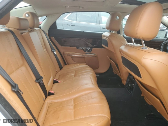 2014 Jaguar XJ with VIN SAJWJ2GD3E8V64988, listed as a Copart auction lot 55375034 with 0 mi miles and Clean Title. Bid and sale history available at carsss.com. Image 10.