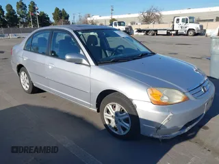 2003 Honda Civic EX with VIN 1HGES25773L003015, listed as a IAAI auction lot 41450561 with 228,620 mi miles. Bid and sale history available at carsss.com. Image 1.