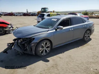 2021 Volkswagen Passat SE with VIN 1VWSA7A38MC013930, listed as a Copart auction lot 58061035 with 127,553 mi miles and Salvage title. Bid and sale history available at DreamBid. Image 1.