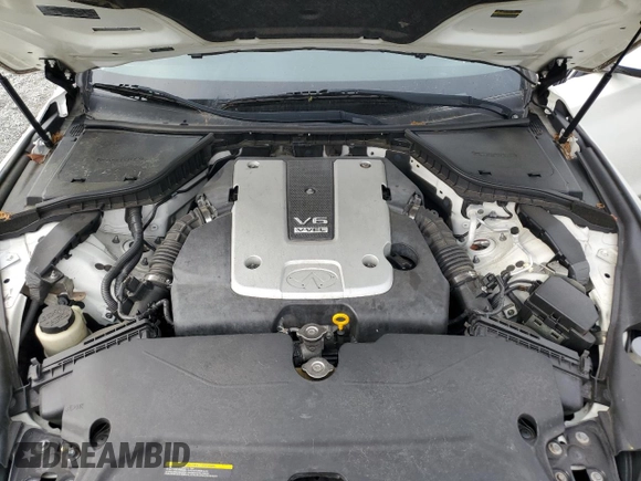 2014 Infiniti Q50 Premium с VIN JN1BV7ARXEM697759, выставлен на аукционе Copart как лот 55996815 с пробегом 129 642 миль миль и Списание • Salvage title. История ставок и продаж доступна на DreamBid. Изображение 11.