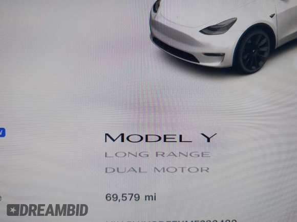 2021 Tesla Model Y Long Range with VIN 5YJYGDEEXMF280480, listed as a IAAI auction lot 41993633 with 69,579 mi miles. Bid and sale history available at carsss.com. Image 16.