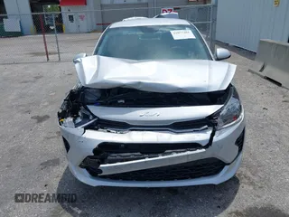 2023 Kia Rio S z VIN 3KPA24AD4PE604207, wystawiony jako IAAI lot #42077201 z przebiegiem 16 559 mil mil oraz . Historia ofert i sprzedaży dostępna na DreamBid. Obrazek 12.