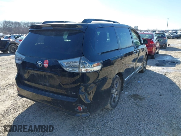 2014 Toyota Sienna SE with VIN 5TDXK3DC3ES521202, listed as a IAAI auction lot 41579320 with 182,982 mi miles and . Bid and sale history available at DreamBid. Image 4.