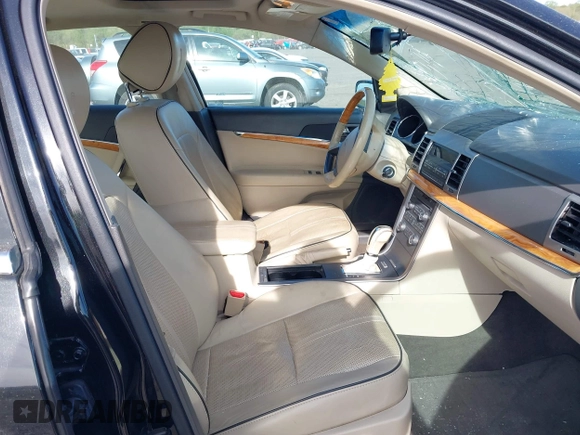 2012 Lincoln MKZ with VIN 3LNHL2JC5CR829225, listed as a IAAI auction lot 42088988 with 121,136 mi miles. Bid and sale history available at carsss.com. Image 5.