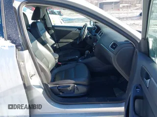 2014 Volkswagen Jetta TDI w/Premium/Nav z VIN 3VWLL7AJXEM382611, wystawiony jako IAAI lot #41609335 z przebiegiem 120 000 mil mil oraz . Historia ofert i sprzedaży dostępna na DreamBid. Obrazek 5.