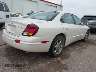2002 Oldsmobile Aurora with VIN 1G3GS64C124127044, listed as a IAAI auction lot 41770179 with 119,841 mi miles and . Bid and sale history available at DreamBid. Image 4.